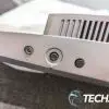 The power and control buttons on the bottom edge of the BenQ MOBIUZ EX480UZ 48" 4K OLED Gaming Monitor. The power and control buttons on the bottom edge of the BenQ MOBIUZ EX480UZ 48" 4K OLED Gaming Monitor