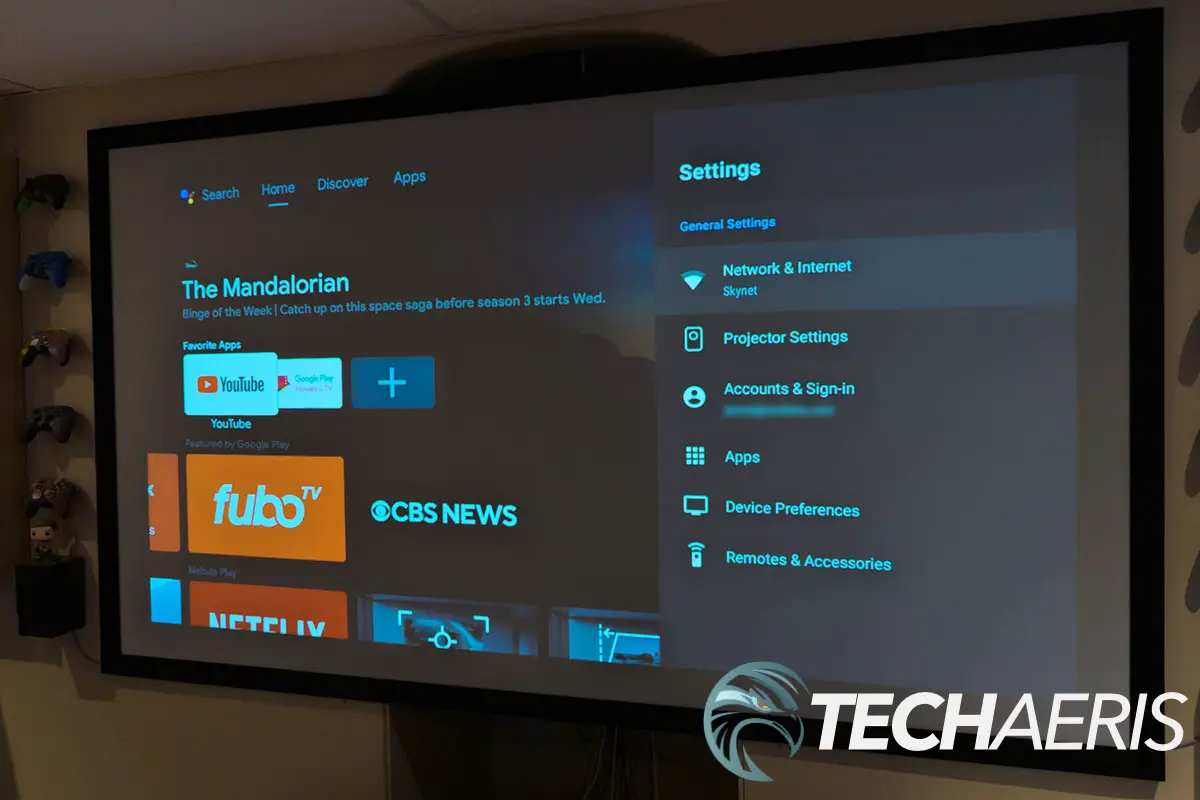 The display quality of the Anker Nebula Capsule 3 Laser portable projector at about 80" across on a projector screen in a barely lit room