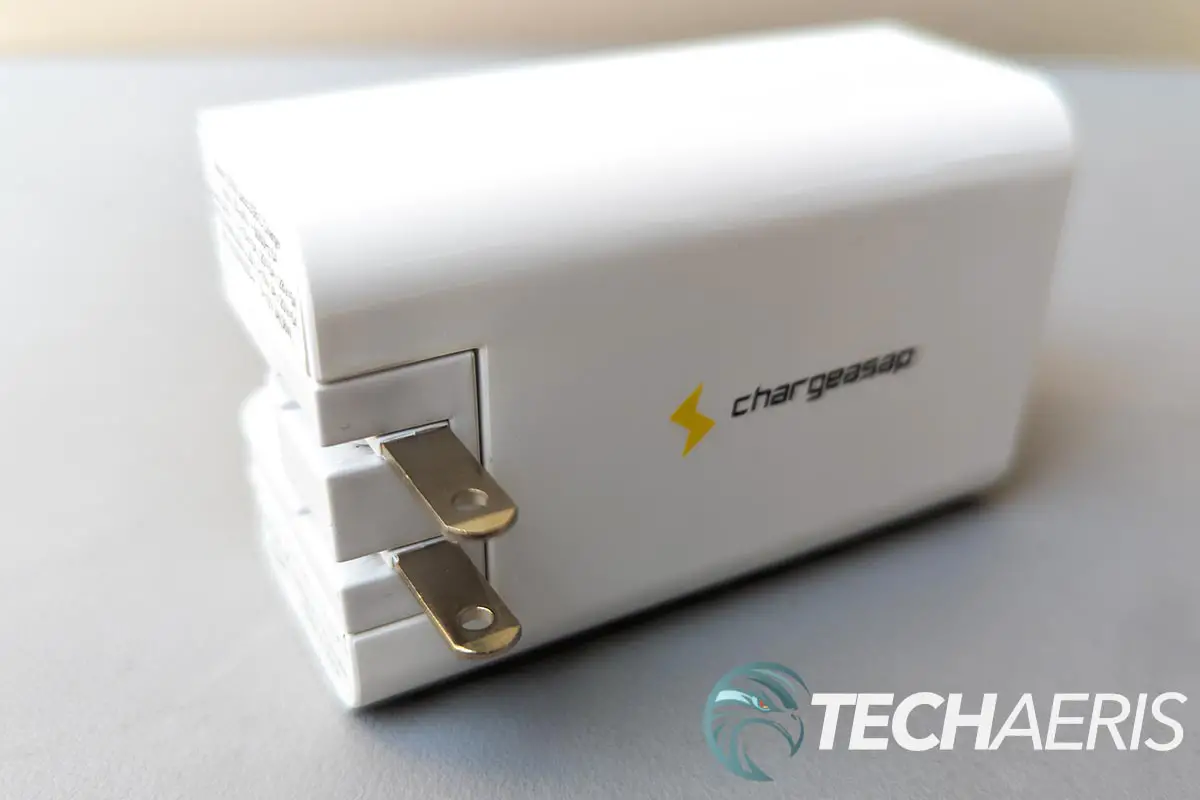 The Chargeasap Zeus 270W USB-C GaN Wall Charger with the US plugs extended at a right angle