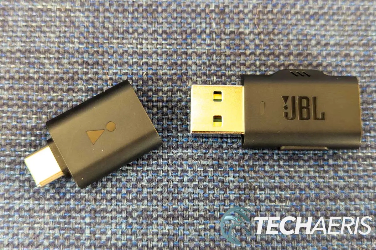 The USB-A dongle and USB-C adapter included with the JBL Quantum 910X Wireless gaming headset for Xbox