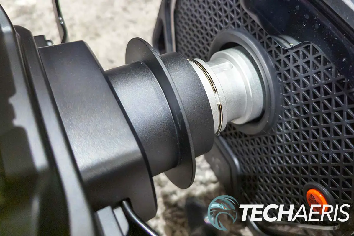 Detail view of the Logitech G PRO Racing Rim detached from the Wheel Base using the quick release system