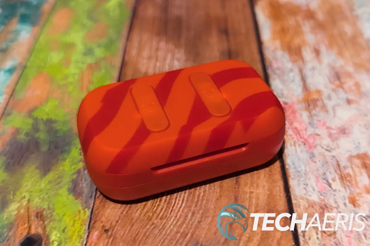 The limited edition Skullcandy x Doritos Dime 2 True Wireless Earbuds inside the included charging/carrying case